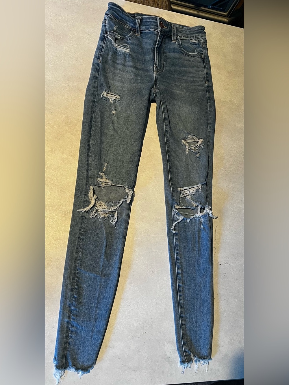American Eagle  Blue Ripped Skinny Jeans size 0